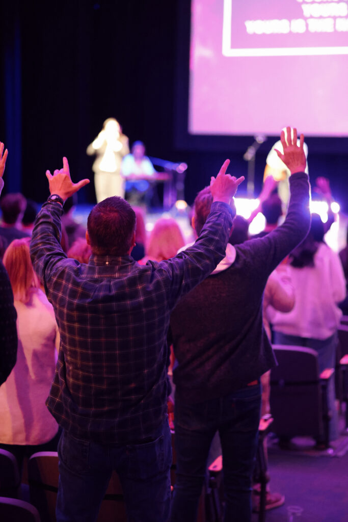 hands raised in worship Vintage Church